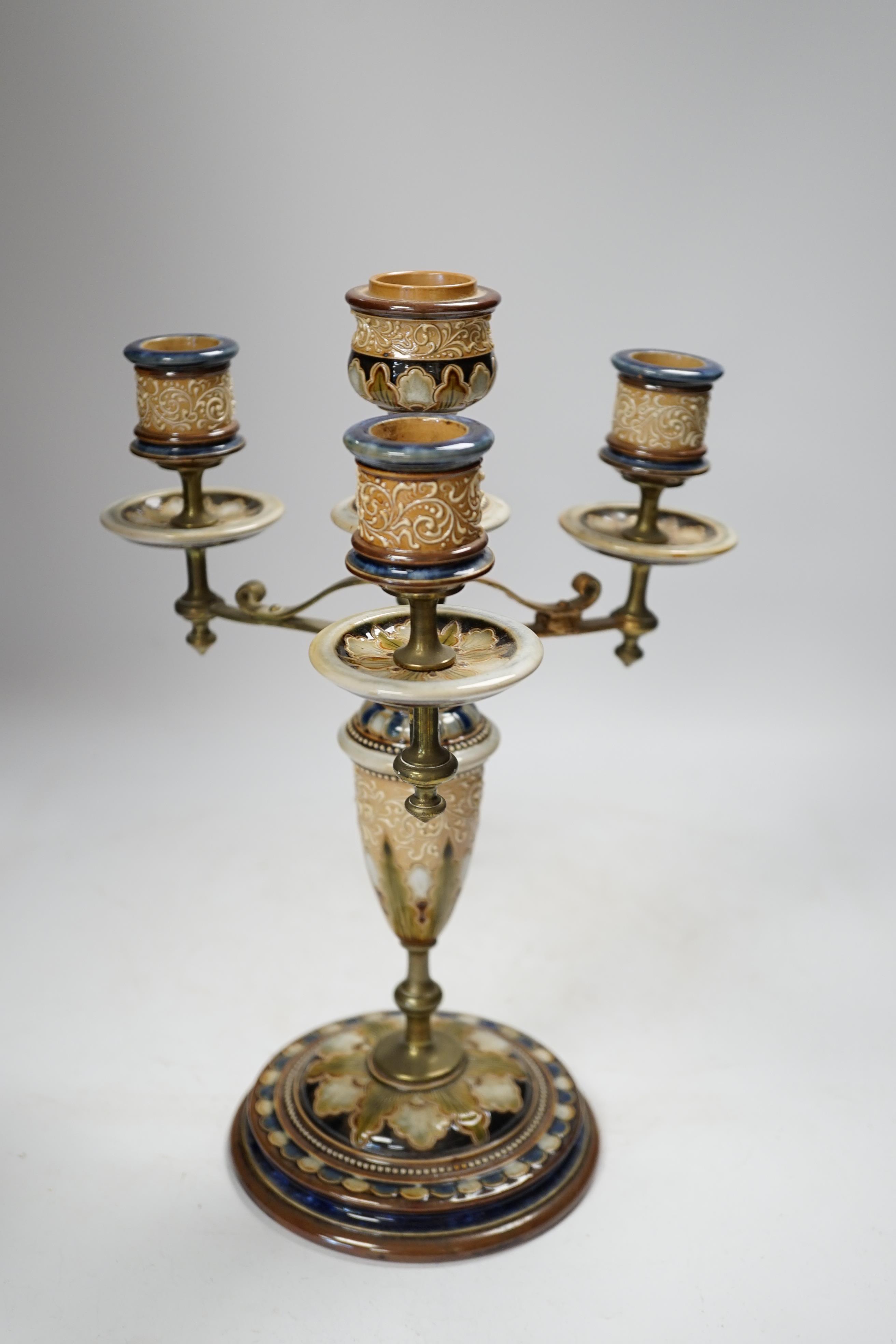 A Royal Doulton three branch four light candelabra, Eliza Simmance, 33cm high, Condition - poor to fair, one arm restored